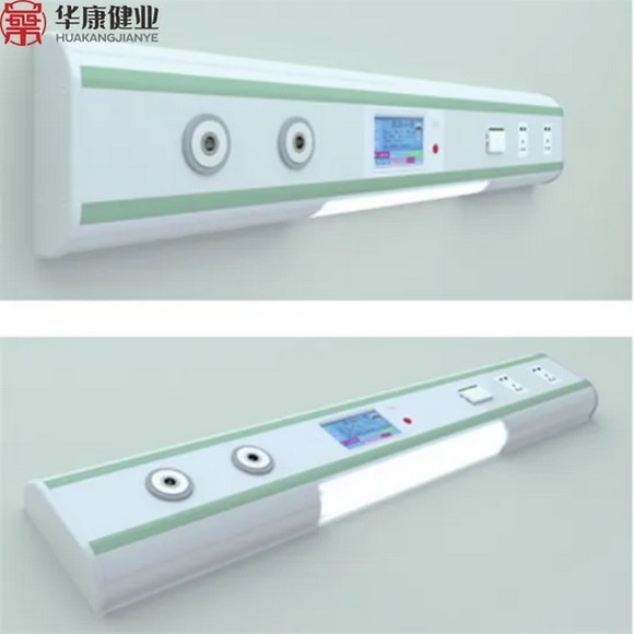 Vòi cấp oxy và đồng hồ đo gắn cạnh đầu giường trong phòng khách sạn ở Lhasa